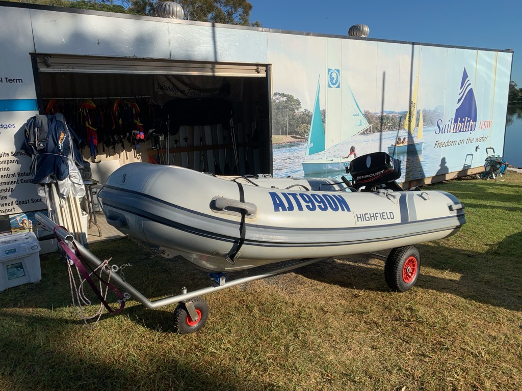 Safety boat in front of Tweed Heads storage container